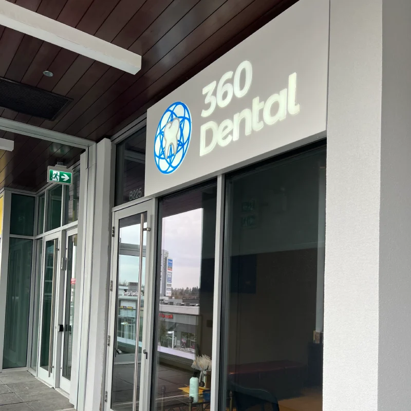 happy couple smiling in park